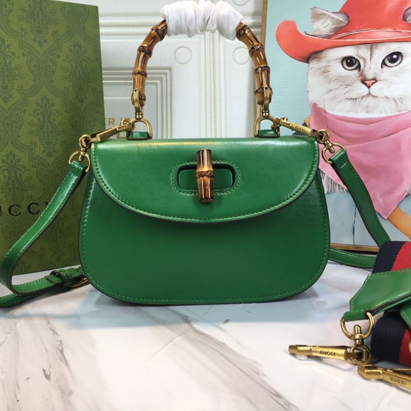 G*u*i top handle bags